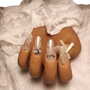 Press-on Nagels #008 – Champagne Glitter Amandel met Satijnen Strikje & Hartjes | Quida